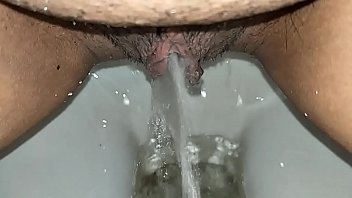 Pissing in toilet  woman