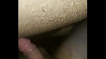 Jerking off soft penis in room