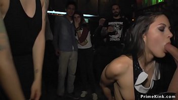 Hot brunette slave dragged in crowded bar where made to suck huge dick and take cum in her mouth