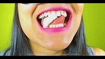 This horny girl has really nice white teeth and shows you what she can do with it. No chance for the huge carrot, gums are really crushe