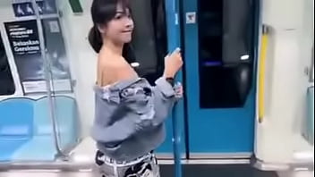 Asian girl show her tits to public